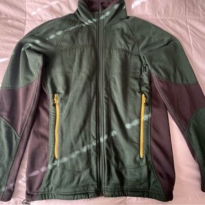 The North Face Men's Olive Performance Jacket with Yellow Zippers.